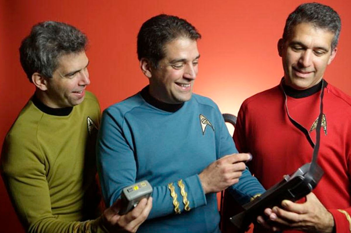 Dr. Basil Harris, flanked by his brothers George, at left, and Constantine (Gus), pose in “Star Trek” uniforms and tricorder props from the popular science fiction franchise.   (XPRIZE)