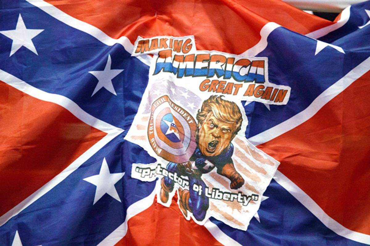 A Confederate flag with a depiction of Donald Trump (AP/Evan Vucci)