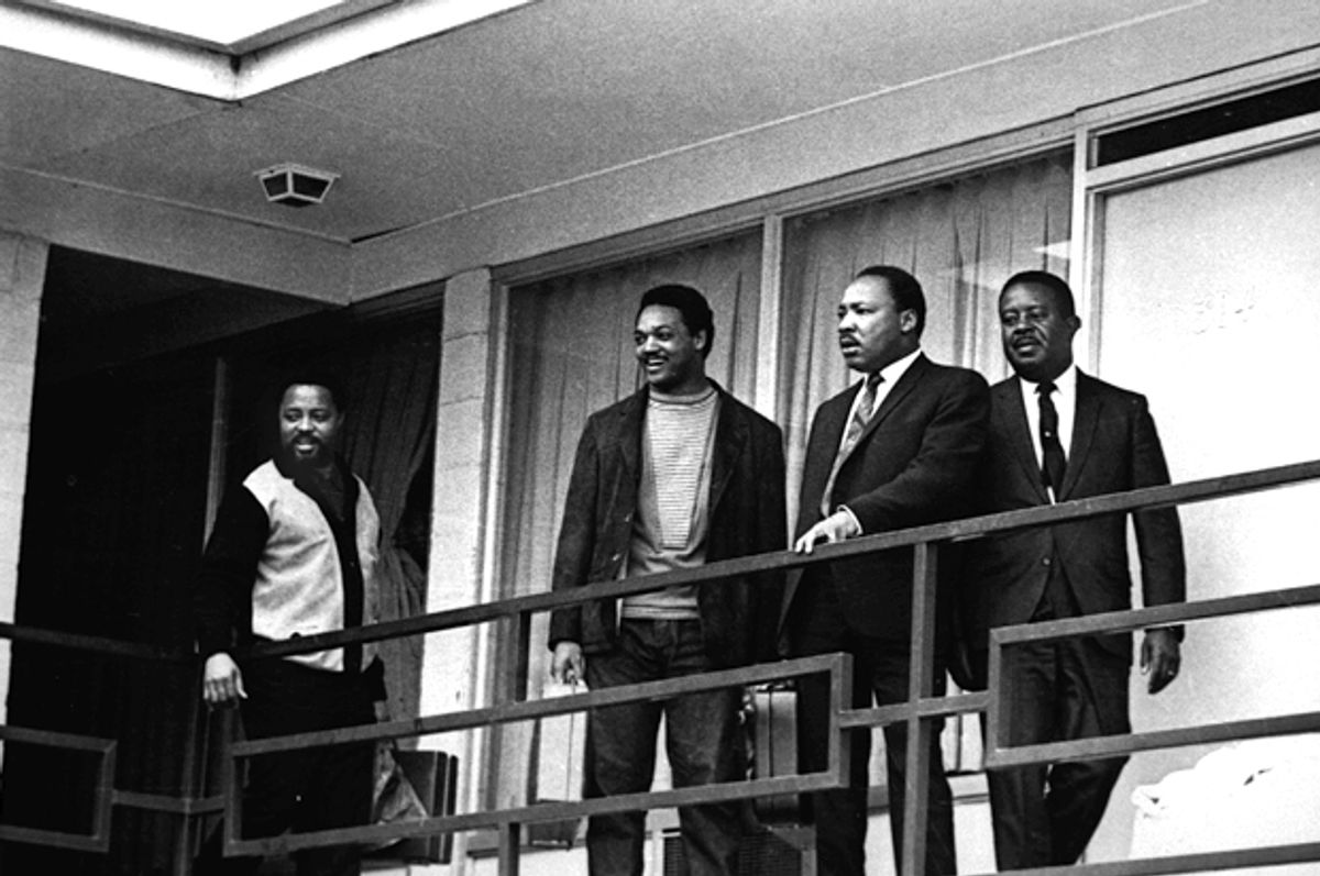 The Rev. Martin Luther King Jr. stands with other civil rights leaders on the balcony of the Lorraine Motel in Memphis, Tenn., on April 3, 1968, a day before he was assassinated.   (AP)