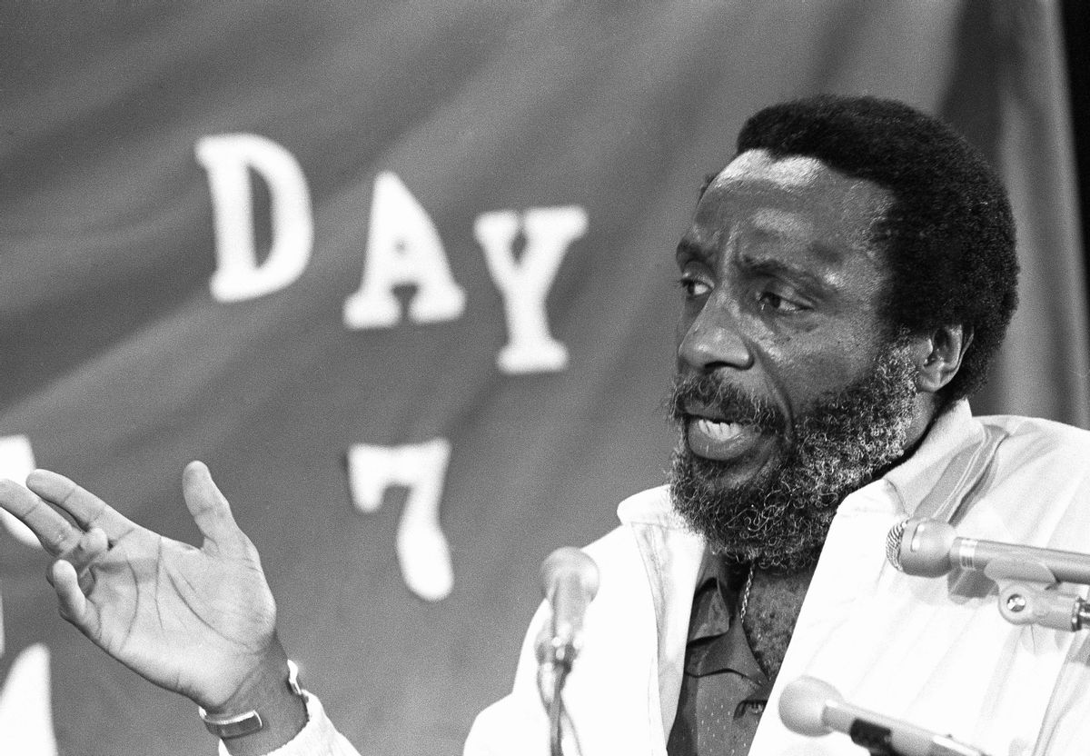 Political activist Dick Gregory talk with the press in Springfield , May 24, 1982. Gregory entered his third day of a five-day total fast with no food or water. He joined seven women who are fasting on water only in protest of Illinois' failure to pass the Equal Rights Amendment. The women entered their seventh day of fasting, vowing to keep it up until the passage of E.R.A by the Illinois legislature. (AP Photo) (AP Photo)