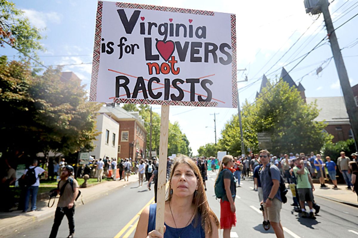 A counter-demonstrator marches down the street after the 'Unite the Right' rally was declared an unlawful gathering. (Getty/Chip Somodevilla)