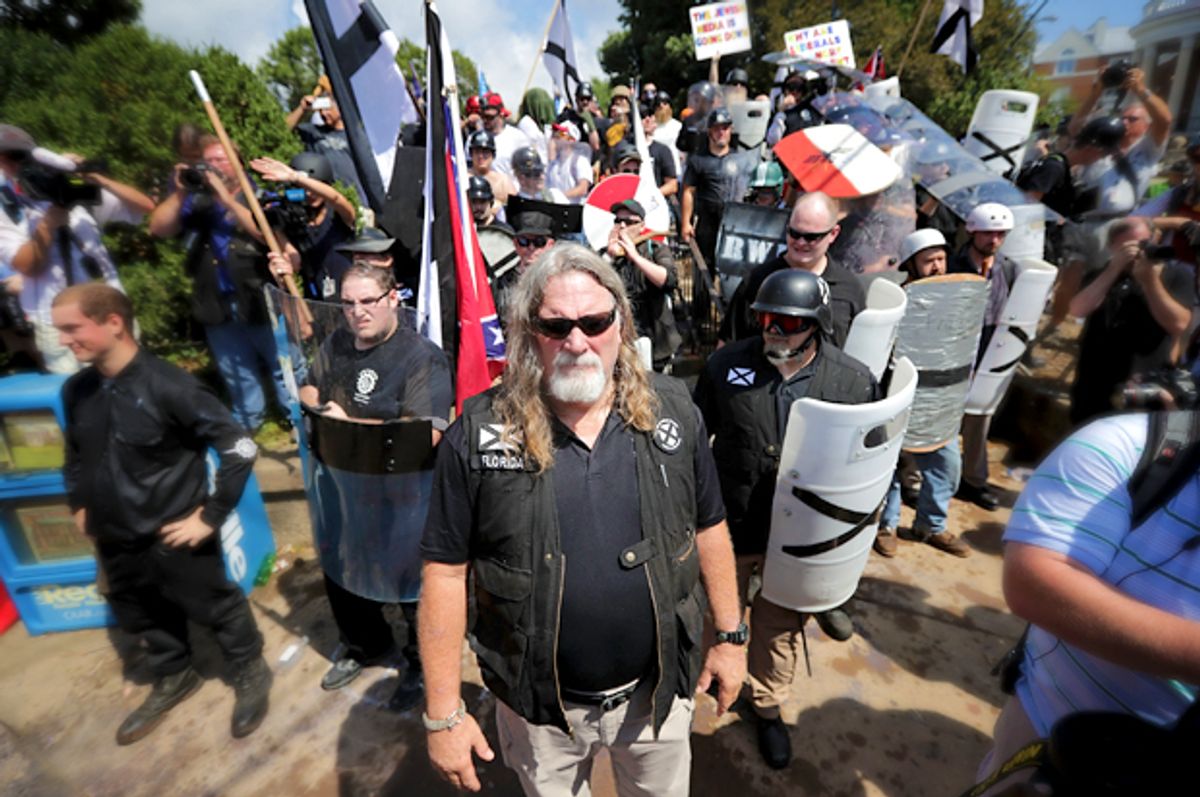 White nationalists, neo-Nazis and members of the "alt-right" exchange insults with counter-protesters as they attempt to guard the entrance to Emancipation Park (Getty/Chip Somodevilla)