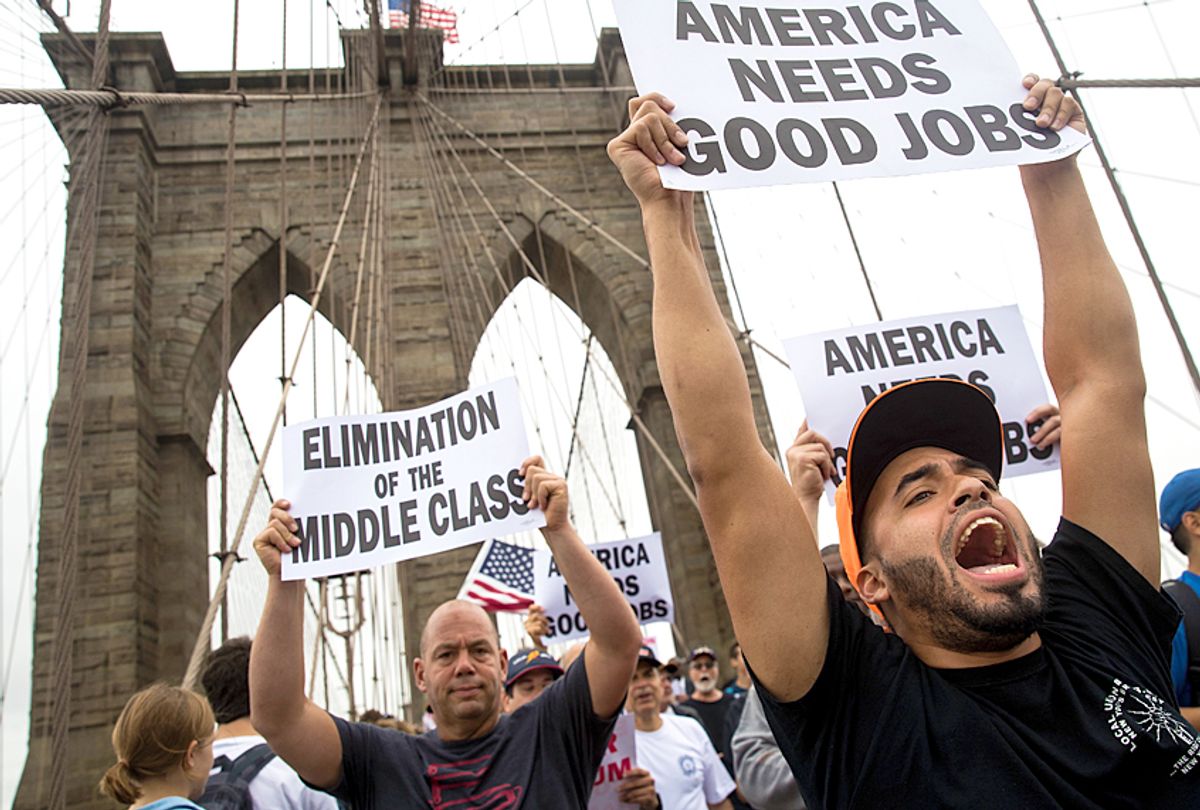 Hundreds of union members march in support of IBEW Local 3 (Getty/Drew Angerer)