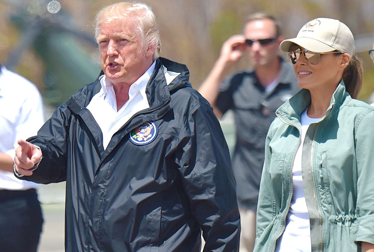 Donald Trump and Melania Trump arrive  in Puerto Rico. (Getty/Hector Retamal)