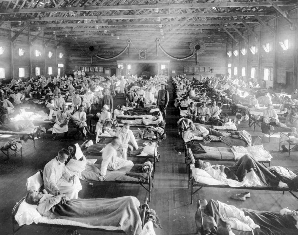 In this 1918 photograph provided by the National Museum of Heath, influenza victims crowd into an emergency hospital at Camp Funston, a subdivision of Fort Riley in Kansas.  (AP Photo/National Museum of Health, File)