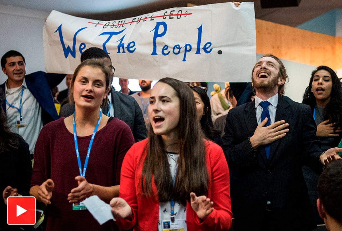People disturb an event titled: "The Role of Cleaner and More Efficient Fossil Fuels and Nuclear Power in Climate Mitigation" with friendly singing at the COP 23 United Nations Climate Change Conference on November 13, 2017 in Bonn, Germany. (Getty/Lukas Schulze)