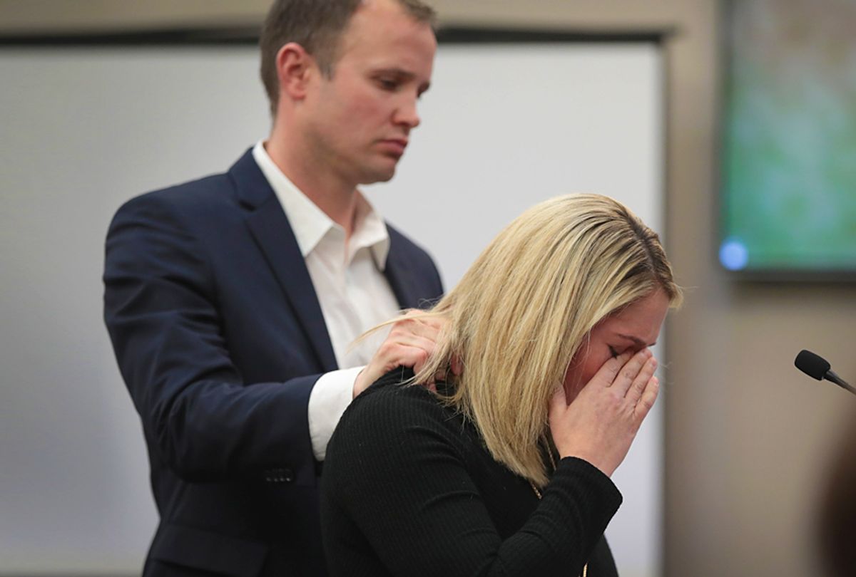 With her husband  by her side, Chelsea Williams delivers a victim impact statement at the sentencing hearing for Larry Nassar. (Getty/Scott Olson)