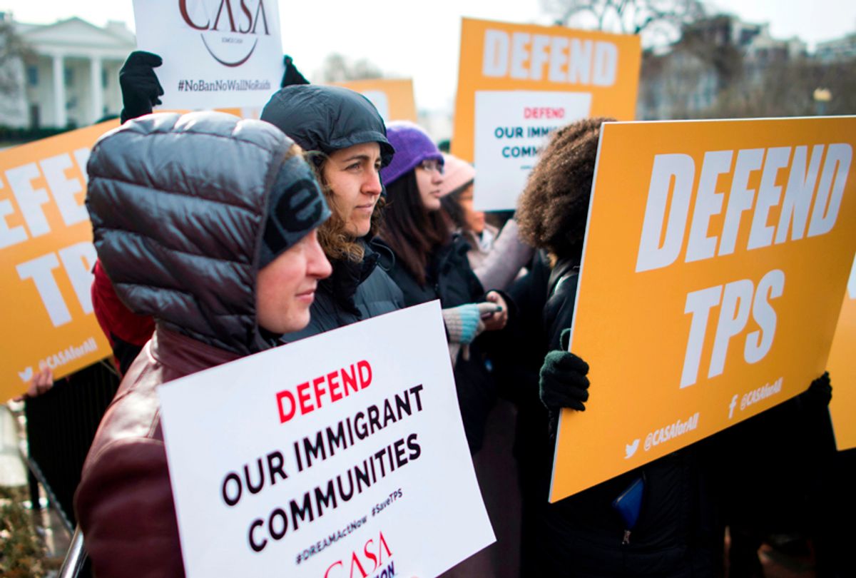 Immigrants and activists protest to demand that the Department of Homeland Security extend Temporary Protected Status (TPS) for more than 195,000 Salvadorans, January 8, 2018 in Washington, DC. (Getty/Andrew Caballero Reynolds)