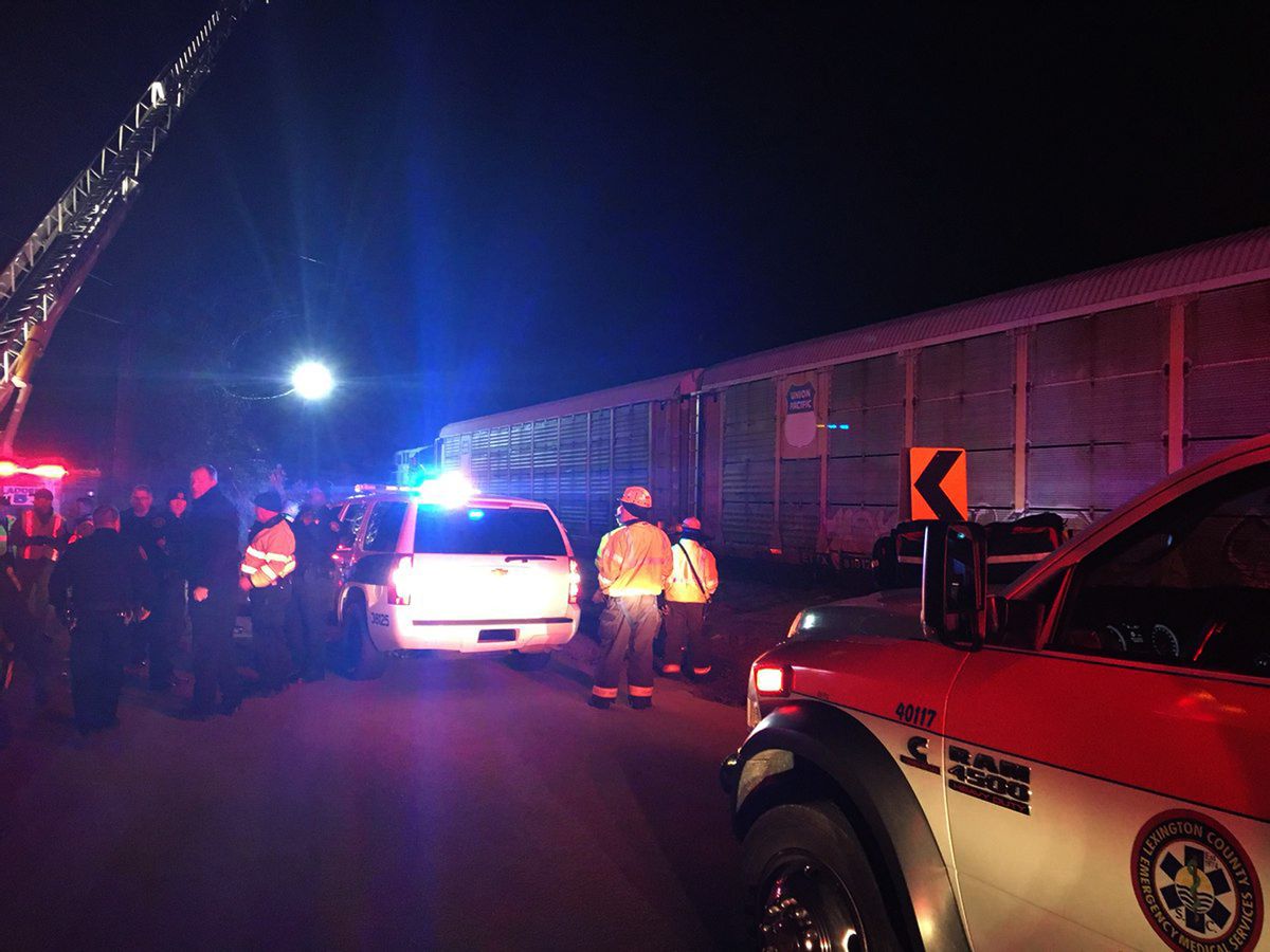 Emergency responders work at the scene of a crash between an Amtrak passenger train and a CSX freight train Sunday, Feb. 4, 2018 in Cayce, S.C. The crash left multiple people dead and dozens of people injured. (Lexington County Sheriff's Department via AP) (AP)
