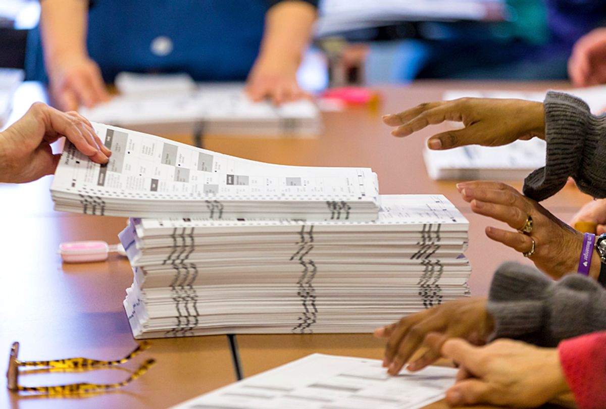 Tabulators work on recounting presidential ballots in Madison, Wisconsin.  (Getty/Andy Manis)