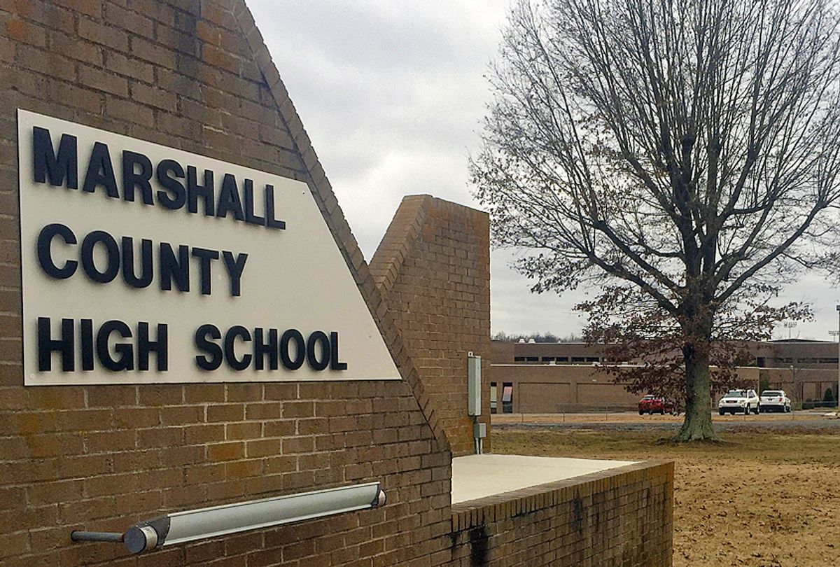 Authorities investigate the scene of fatal school shooting at Marshall County High School, Jan 23, 2018, in Benton, Ky. (AP/Stephen Lance Dennee)