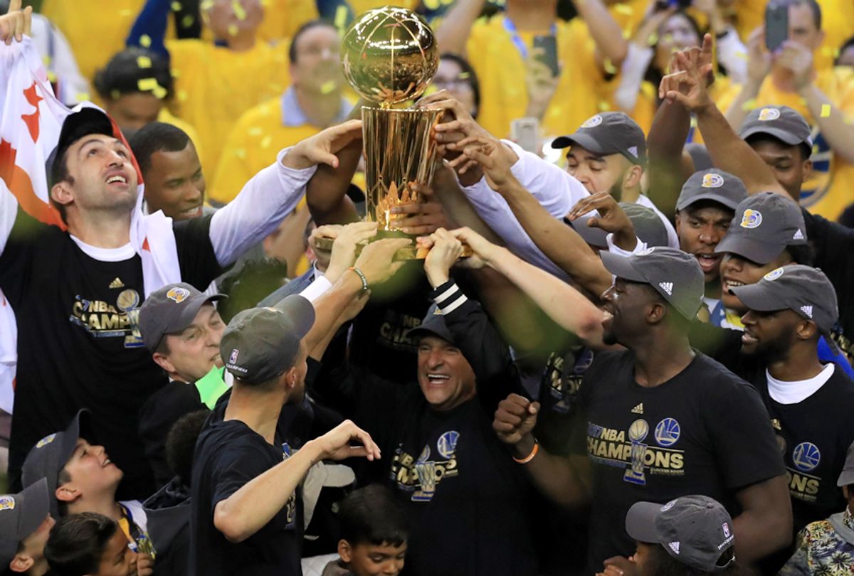 The Golden State Warriors celebrate after winning the 2017 NBA Finals (Getty/Ronald Martinez)