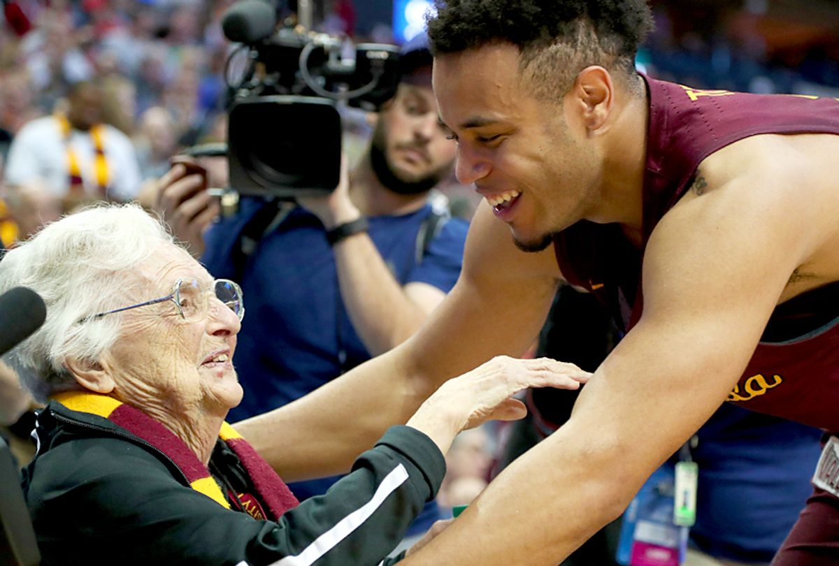 Marques Townes #5 of the Loyola Ramblers celebrates with Sister Jean Dolores-Schmidt. (Getty/Tom Pennington)