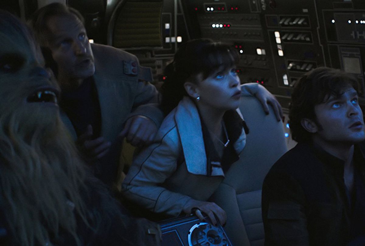 Woody Harrelson, Alden Ehrenreich, Emilia Clarke, and Joonas Suotamo in "Solo: A Star Wars Story" (Lucasfilm Ltd.)