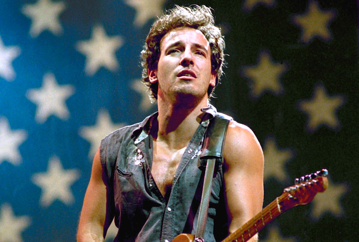 Bruce Springsteen plays "Born in the U.S.A." at Los Angeles Memorial Coliseum in September 1985. (AP/Lennox McLendon)