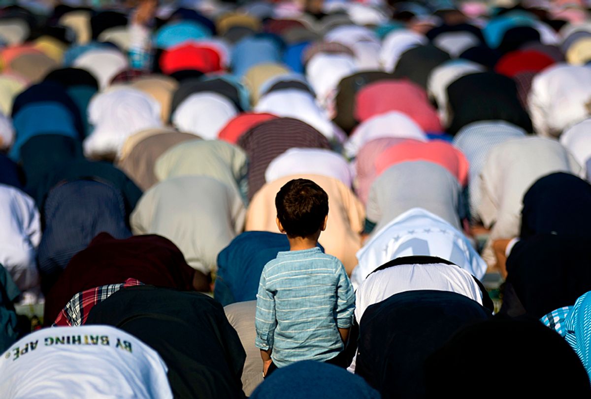 Muslims participate in a group prayer service during Eid al-Fitr in Bensonhurst Park, Brooklyn. (Getty/Drew Angerer)