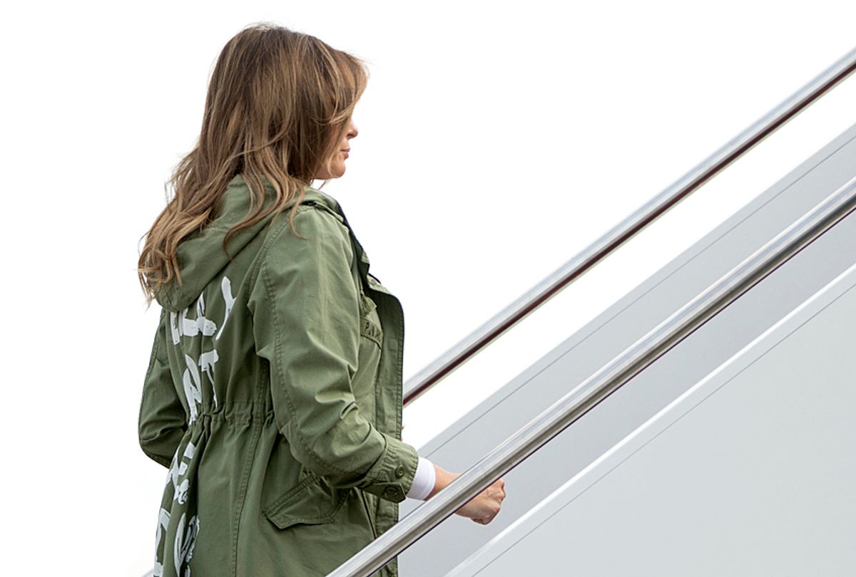 Melania Trump boarding a plane wearing a jacket printed with the message: "I really don't care, do U?" at Andrews Air Force Base, June 21, 2018, to travel to Texas. (AP/Andrew Harnik)