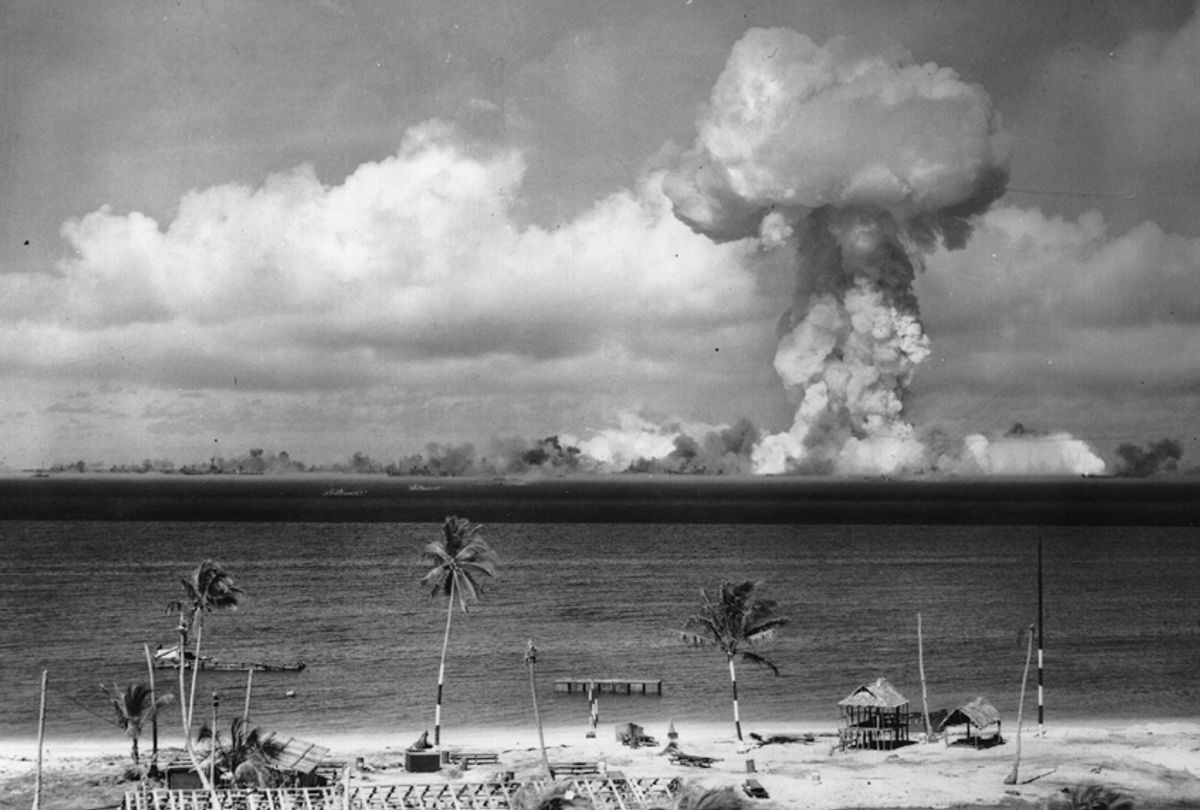 A mushroom cloud forms after the initial Atomic Bomb test explosion off the coast of Bikini Atoll, Marshall Islands, July 1946. (Getty Images)