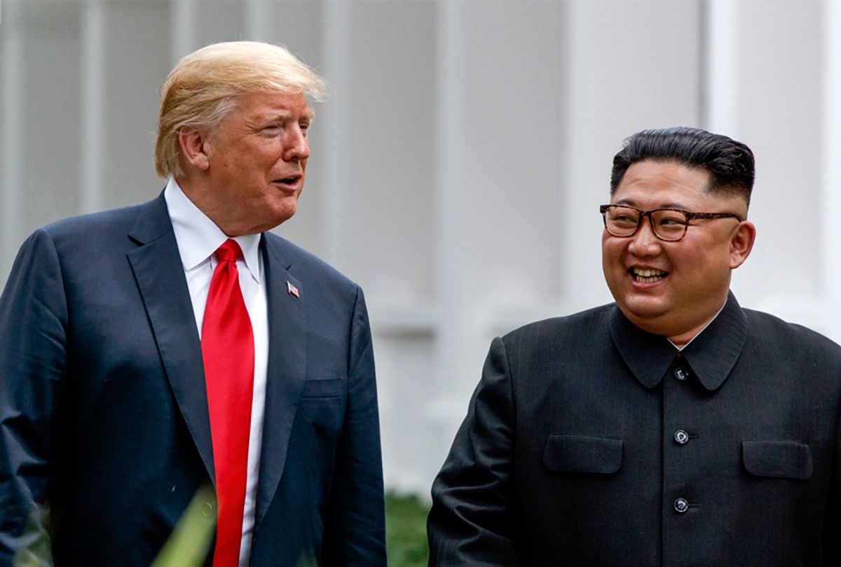 Donald Trump walks with Kim Jong Un, June 12, 2018 in Singapore. (AP/Evan Vucci)