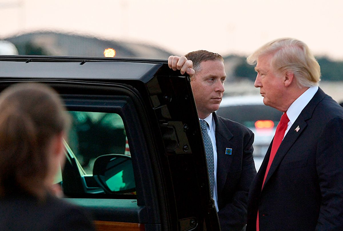 Donald Trump makes his way to board a limousine. (Getty/Mandel Ngan)