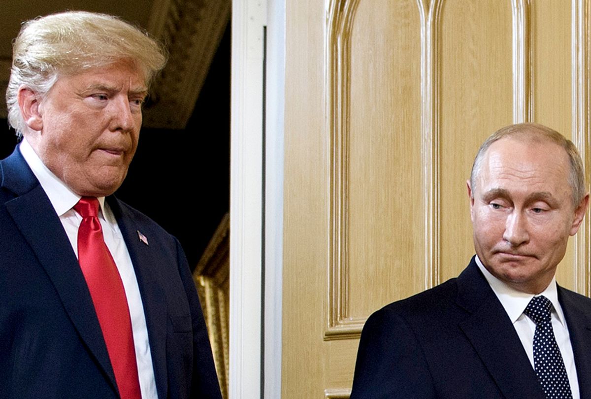 Donald Trump and Vladimir Putin arrive for a meeting in Helsinki, on July 16, 2018. (Getty/Brendan Smialowski)