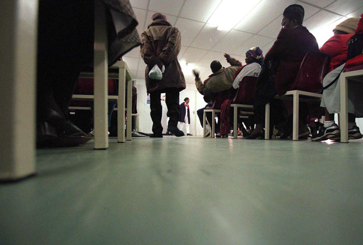 HIV-positive patients attend a class at the Princess Marina Hospital in Gaborone, Botswana, June 26, 2003. (AP/Themba Hadebe)