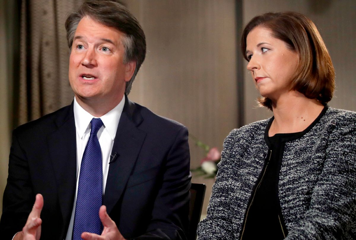 Brett Kavanaugh, with his wife Ashley Estes Kavanaugh, answers questions during a FOX News interview, Monday, Sept. 24, 2018, in Washington, about allegations of sexual misconduct against the Supreme Court nominee. (AP/Jacquelyn Martin)