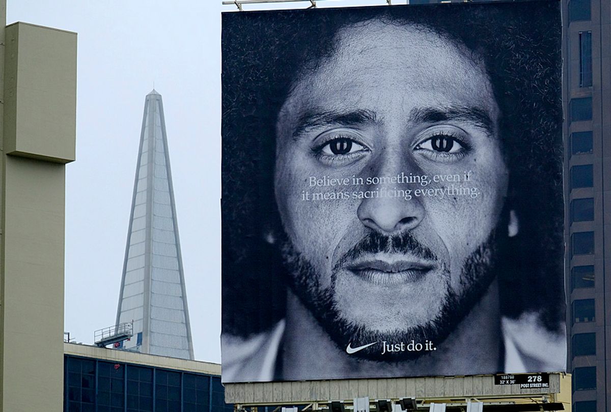 A billboard stands on top of a Nike store showing former San Francisco 49ers quarterback Colin Kaepernick. (AP/Eric Risberg)