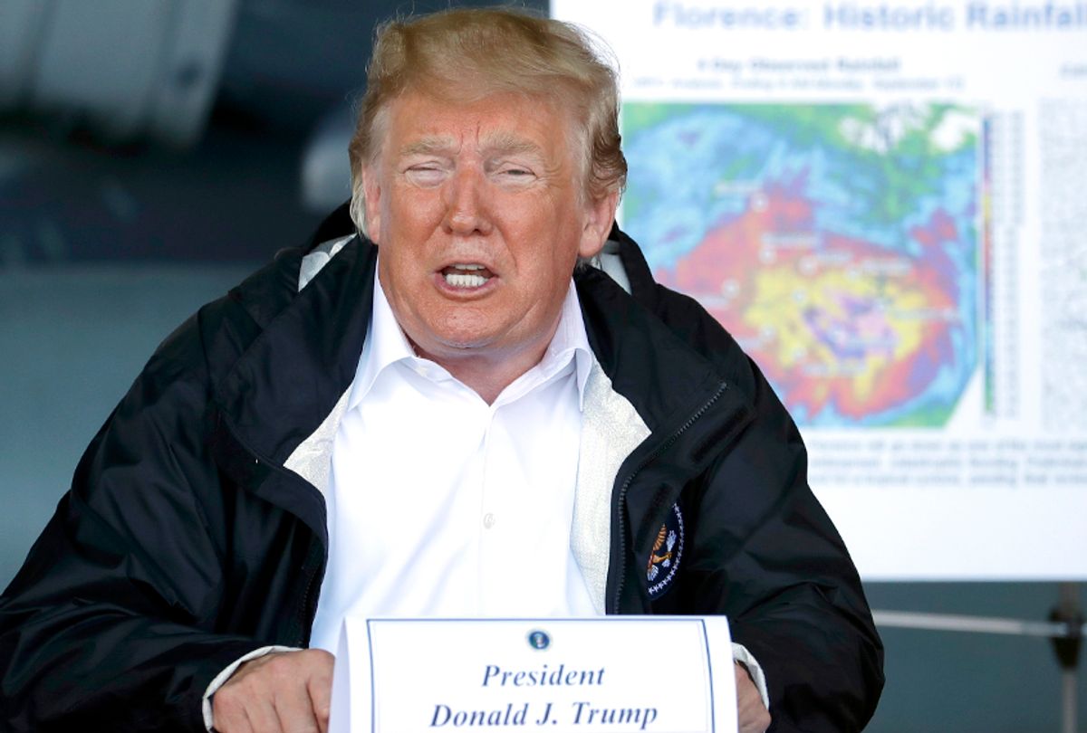 Donald Trump speaks while attending a briefing after arriving at Marine Corps Air Station Cherry Point to visit areas impacted by Hurricane Florence, Wednesday, Sept. 19, 2018, in Havelock, N.C. (AP/Evan Vucci)