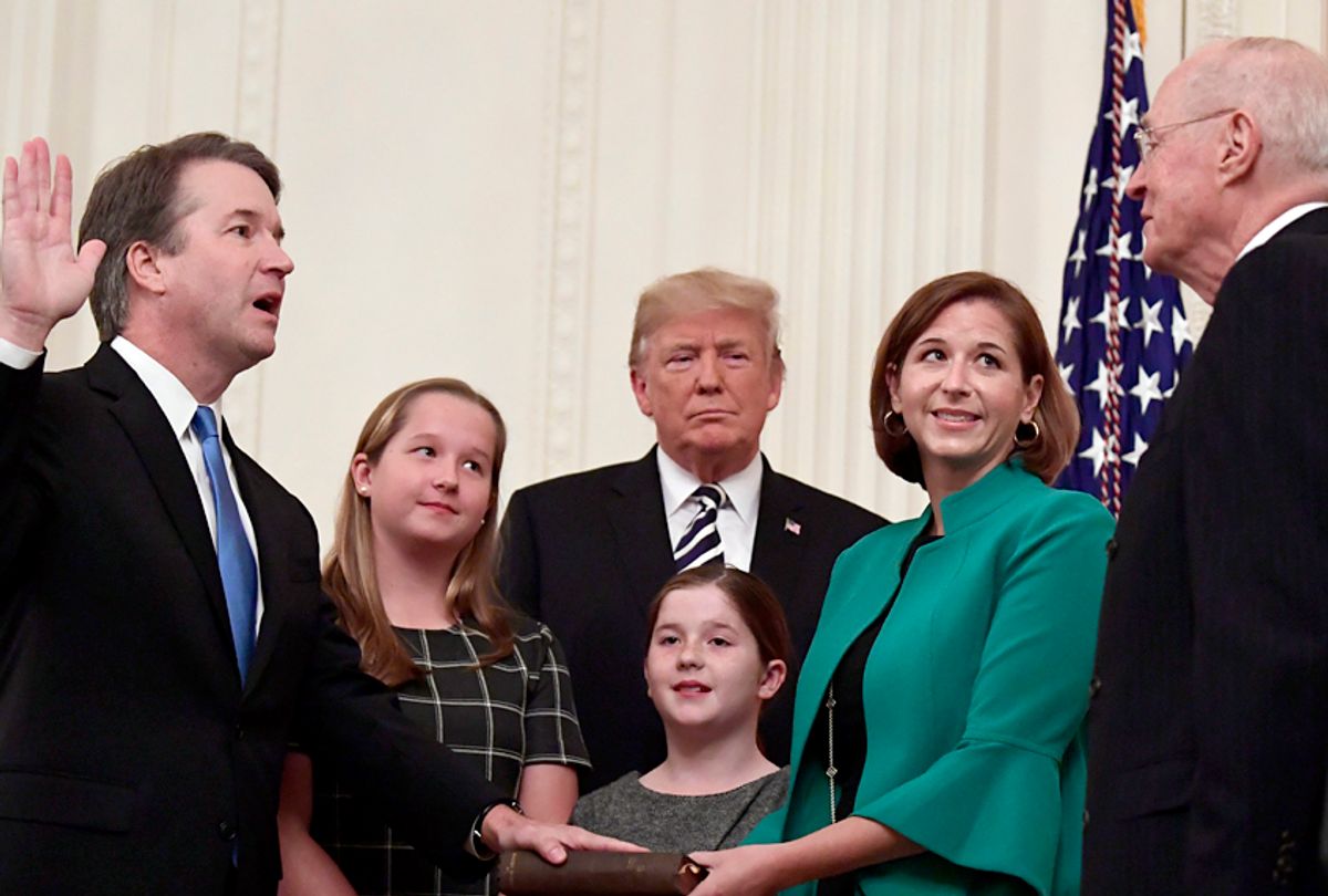 Retired Supreme Court Justice Anthony Kennedy ceremonially swears-in Supreme Court Justice Brett Kavanaugh in the East Room of the White House, Oct. 8, 2018. (AP/Susan Walsh)