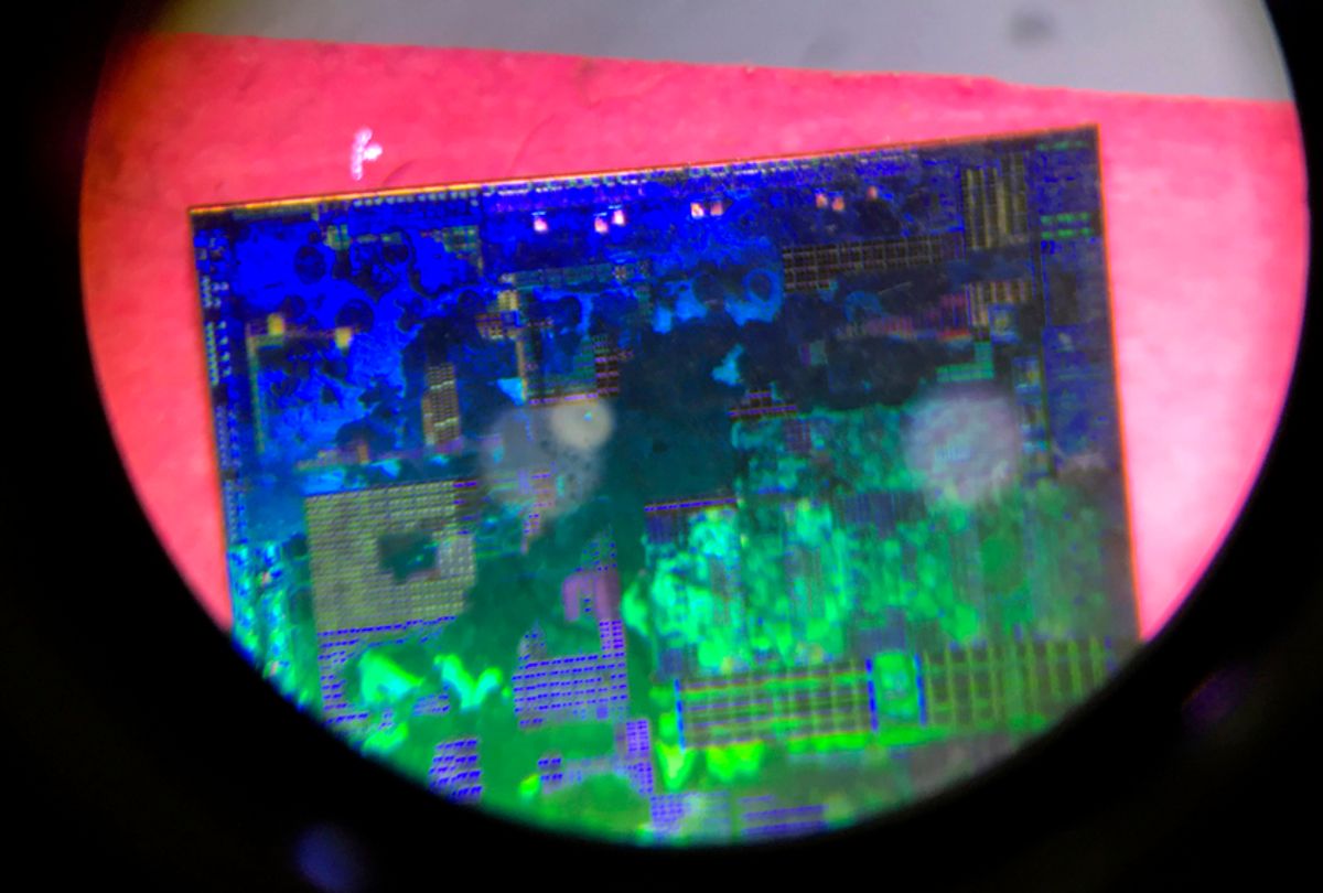 A Chinese microchip is seen through a microscope. (AP/Ng Han Guan))