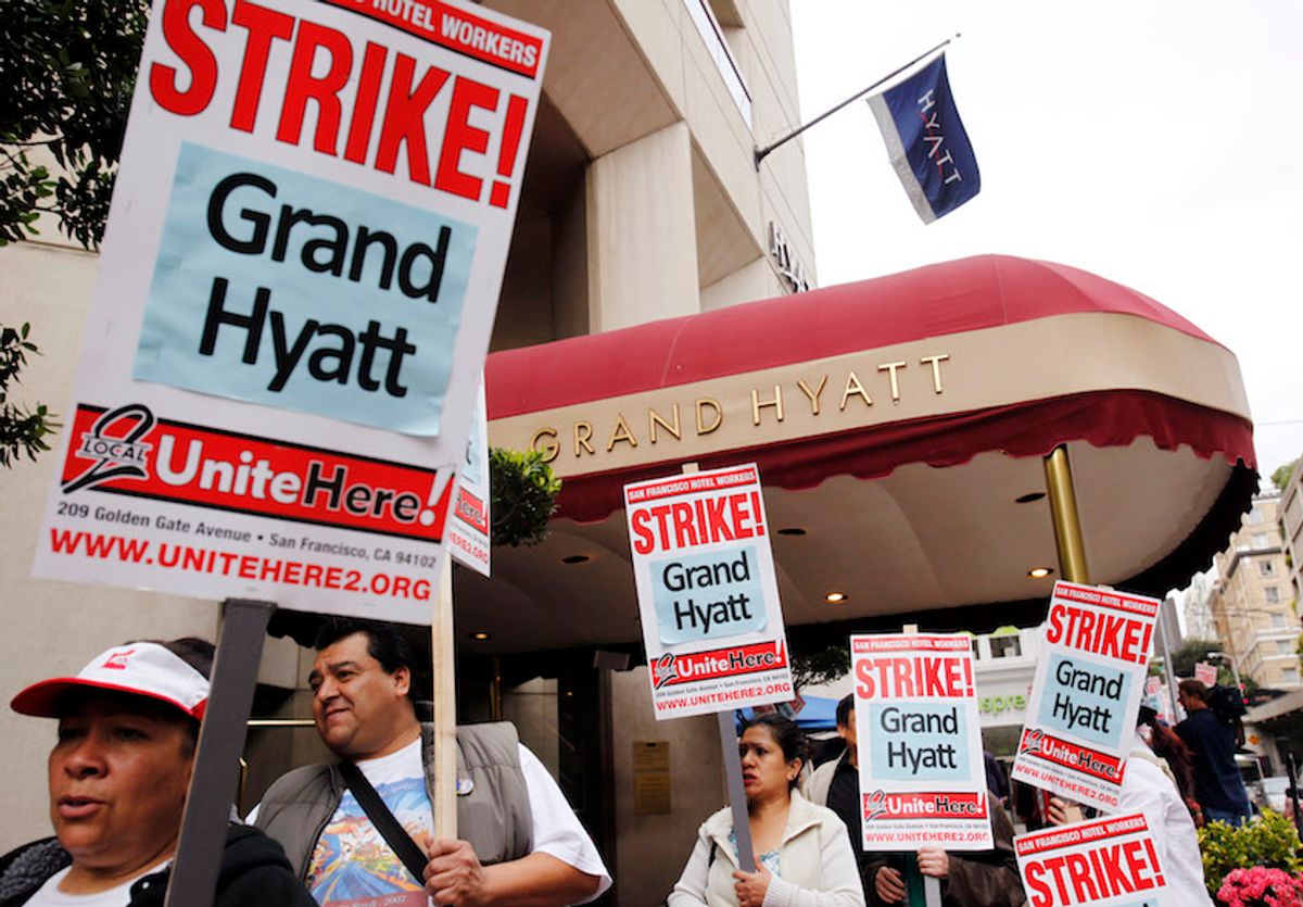 Grand Hyatt workers and supporters strike outside of the Grand Hyatt in the Union Square area of downtown San Francisco, Nov. 5, 2009. (AP/Paul Sakuma)