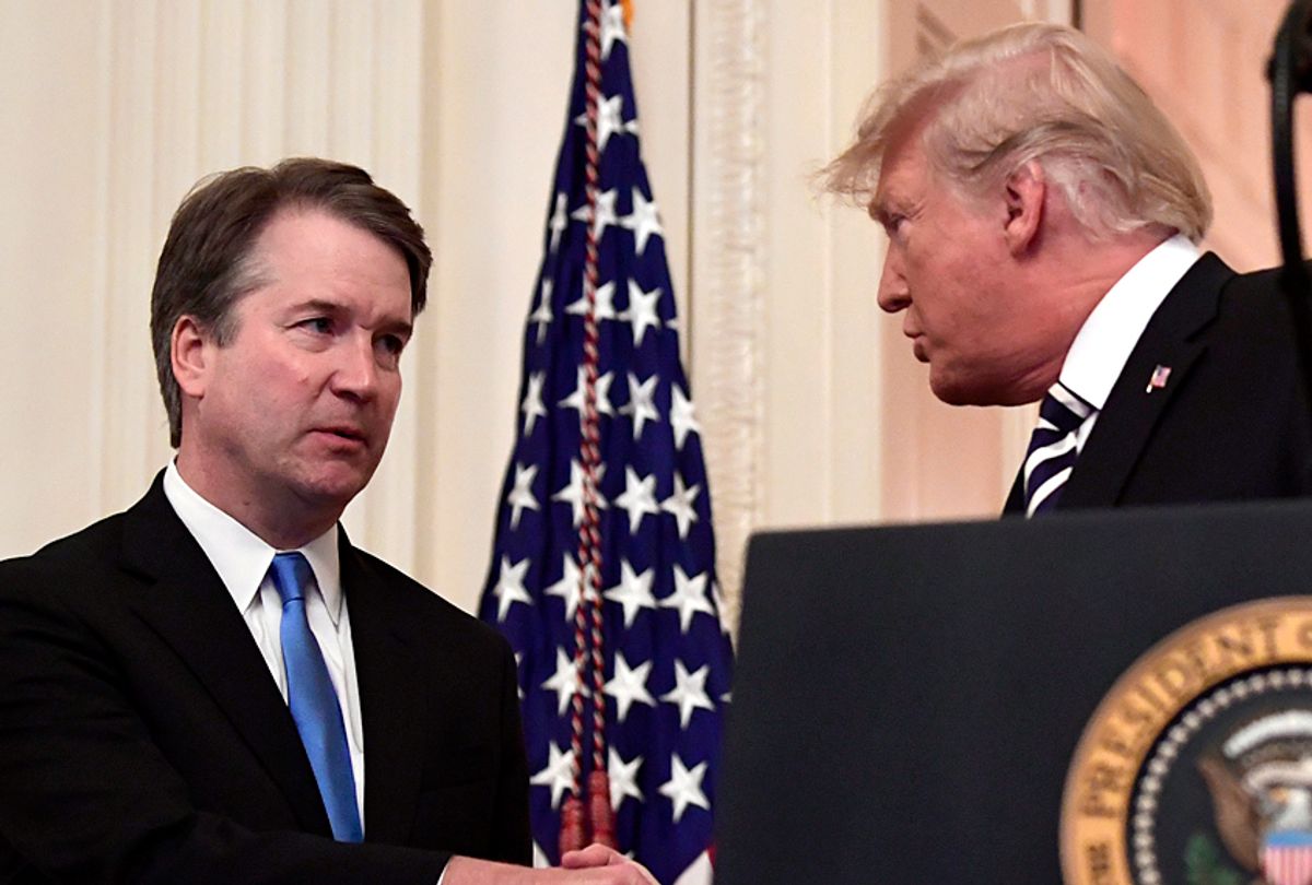President Donald Trump, shakes hands with Supreme Court Justice Brett Kavanaugh before a ceremonial swearing in in the East Room of the White House in Washington, Oct. 8, 2018. (AP/Susan Walsh)