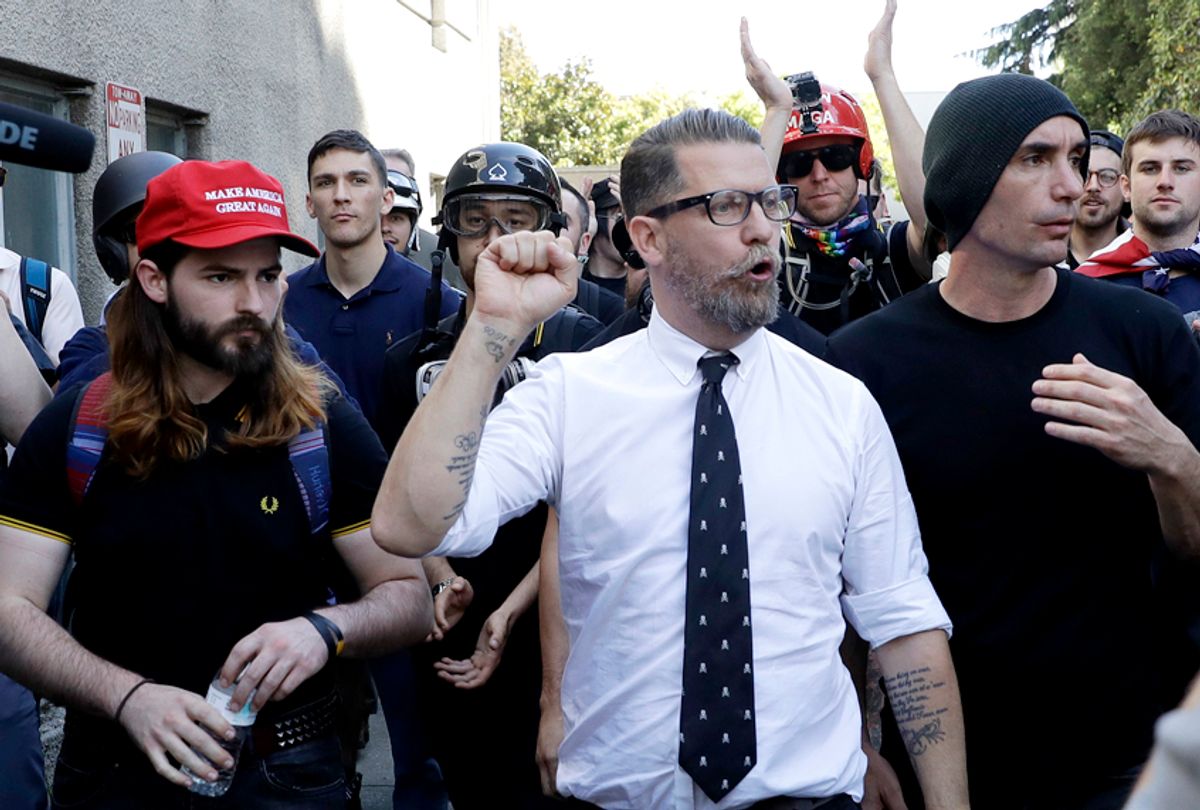 Gavin McInnes, founder of "Proud Boys" is surrounded by supporters after speaking at a rally, April 27, 2017. (AP/Marcio Jose Sanchez)