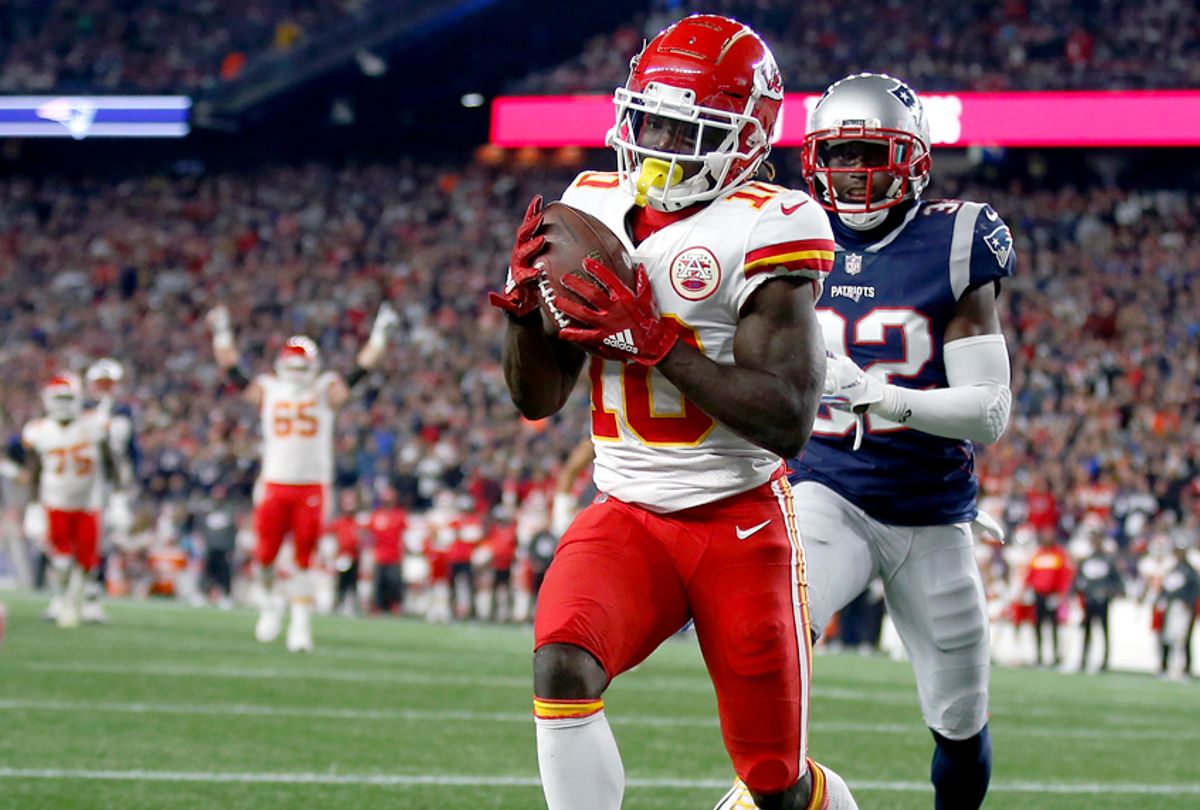 Kansas City Chiefs wide receiver Tyreek Hill catches a touchdown pass in front of New England Patriots defensive back Devin McCourty, Sunday, Oct. 14, 2018, in Foxborough, Mass.  (AP/Michael Dwyer)
