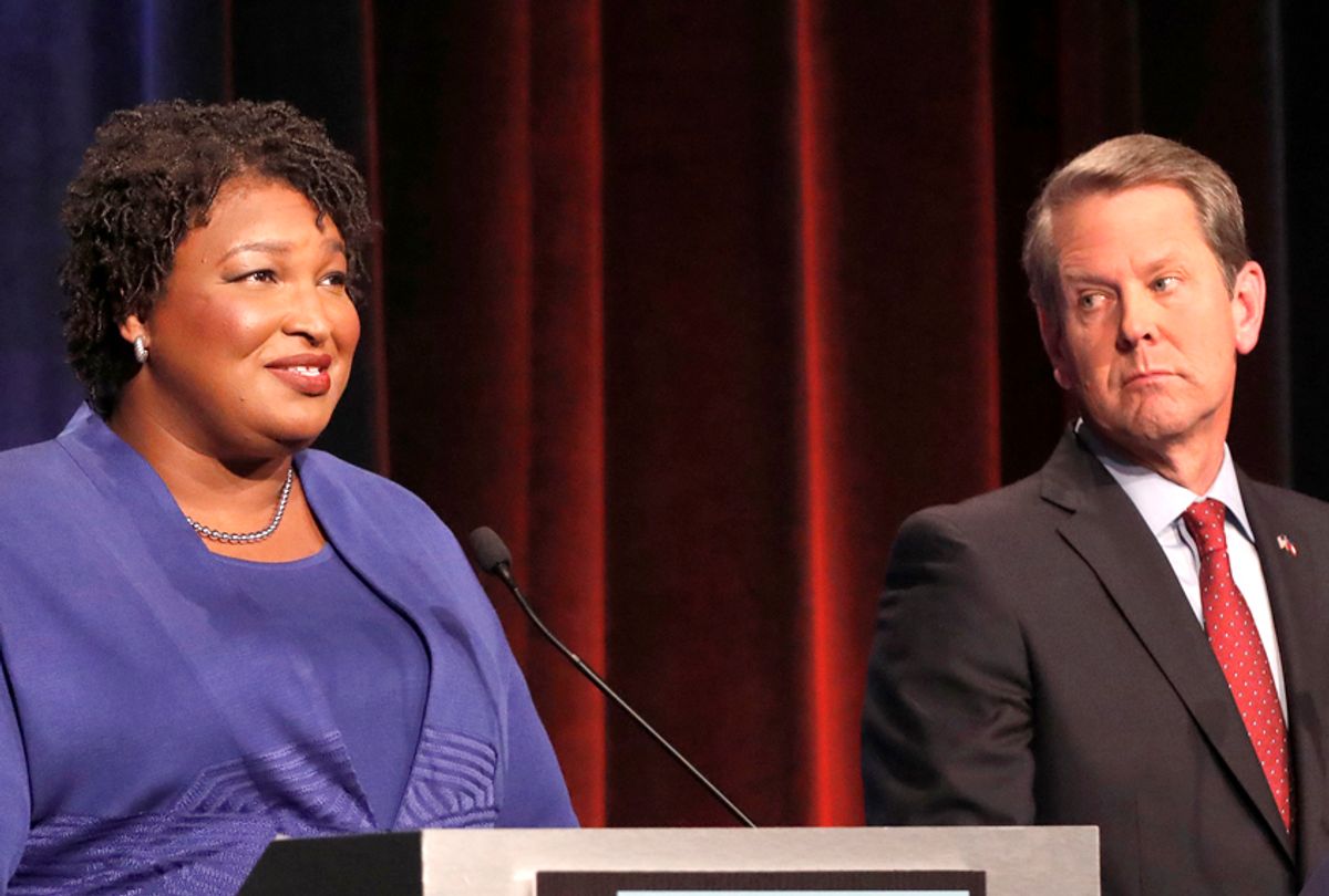 Democratic gubernatorial candidate for Georgia Stacey Abrams, left, speaks as her Republican opponent Secretary of State Brian Kemp looks on during a debate Oct. 23, 2018, in Atlanta. (AP/John Bazemore)