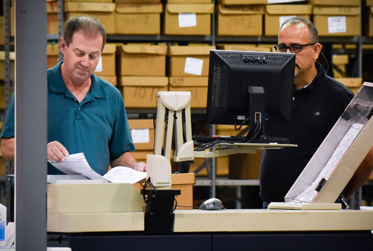 Palm Beach County election officials prepare to recount ballots on November 15, 2018, in West Palm Beach, Florida (Getty/Michele Eve Sandberg)