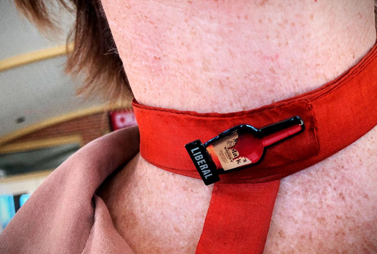 Deanna Tracy of Anderson County, Kentucky, sports a Maker's Mark bourbon "liberal" pin on election day.  (Erin Keane)