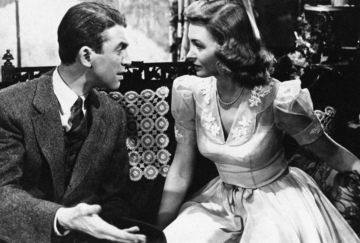 Jimmy Stewart explains things to Donna Reed in “It’s a Wonderful Life” (AP Photo)