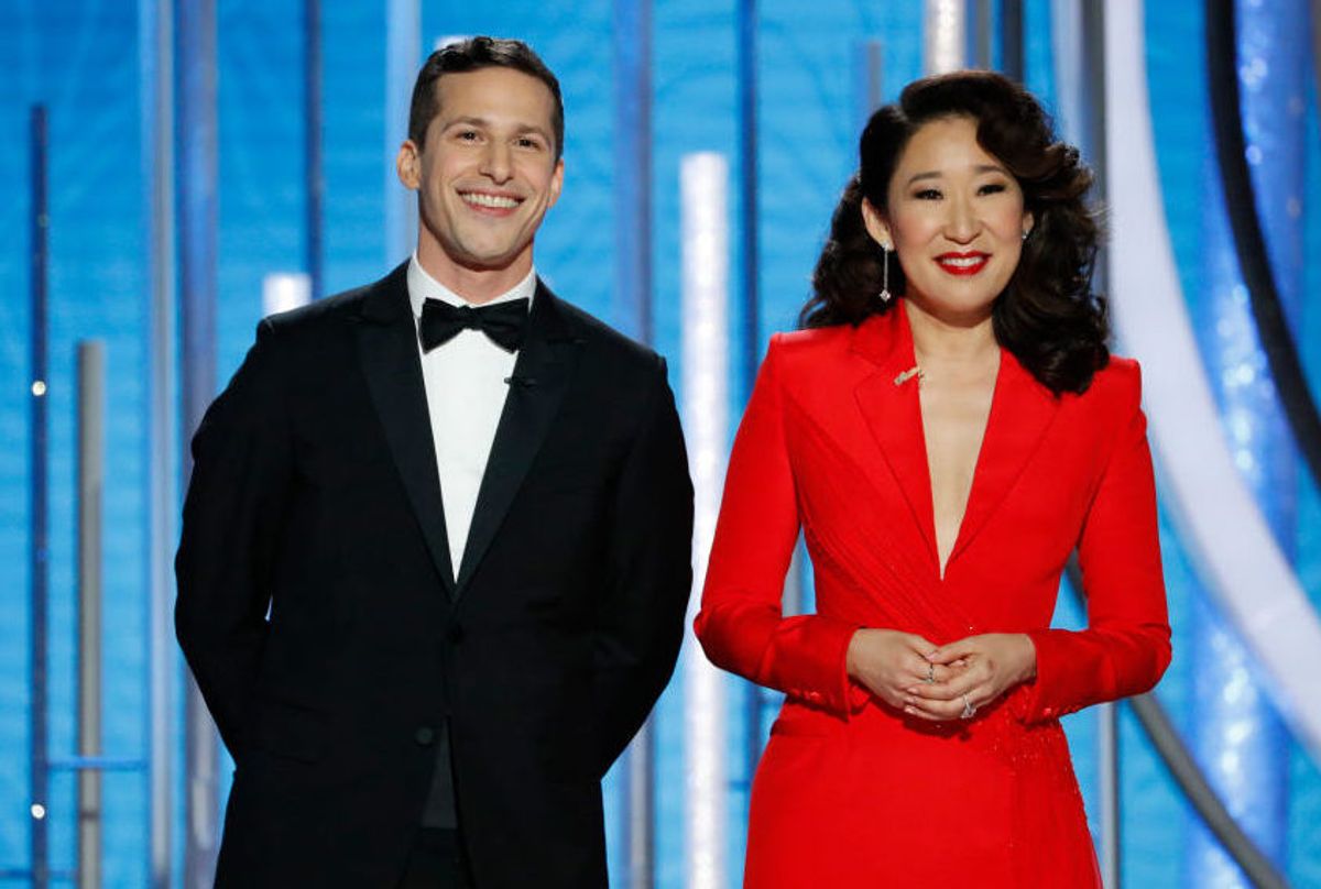 Hosts Andy Samberg and Sandra Oh speak onstage during the 76th Annual Golden Globe Awards (Photo by Paul Drinkwater/NBCUniversal via Getty Images)
