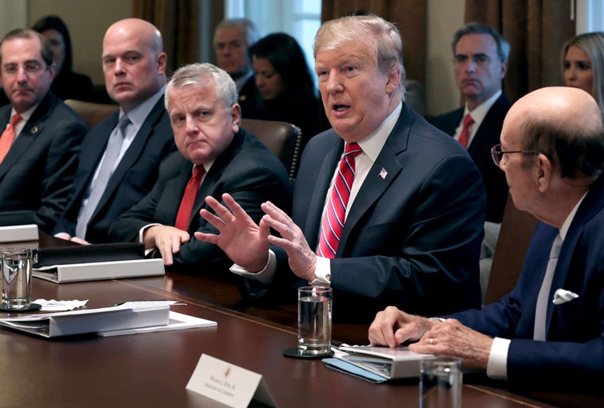 Donald Trump talks to reporters during a meeting with members of his cabinet, including Health and Human Services Secretary Alex Azar, acting Attorney General Matthew Whitaker and Commerce Secretary Wilbur Ross, in the Cabinet Room at the White House February 12, 2019 in Washington, DC. (Getty/Chip Somodevilla)