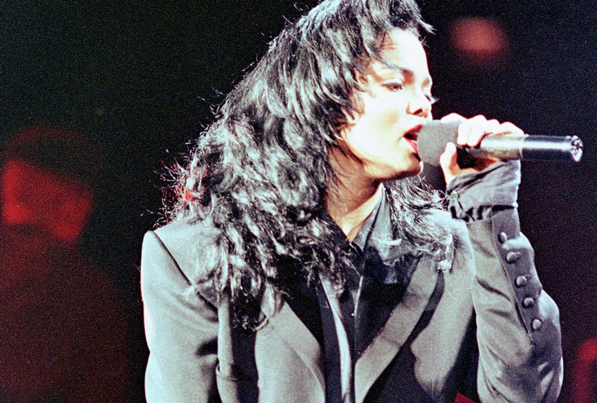 Janet Jackson is shown performing Thursday, March 1, 1990 in Miami Arena during a performance which kicks off her "Rhythm Nation World Tour 1990." (AP/Bill Cookie)