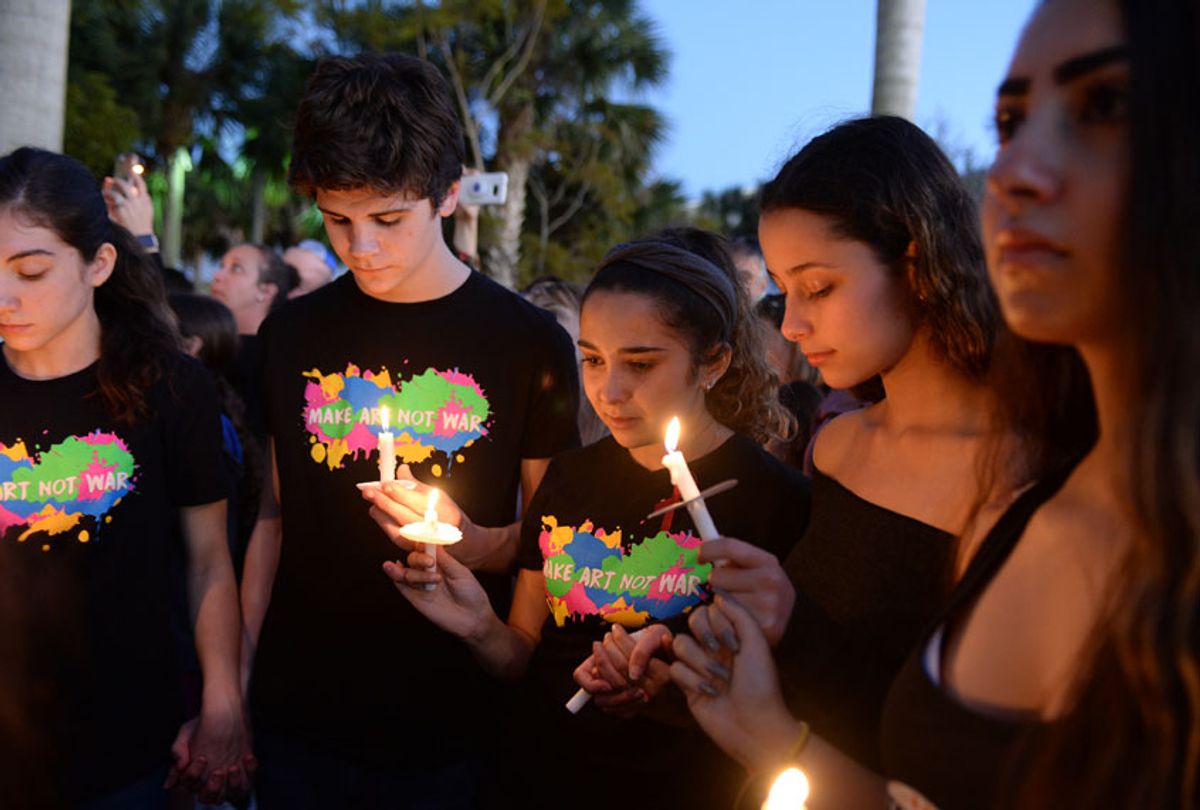 Candlelight memorial service for the victims of the shooting at Marjory Stoneman Douglas High School at Pine Trail Park on February 15, 2018 in Parkland, Florida. (mpi04/MediaPunch/IPX)