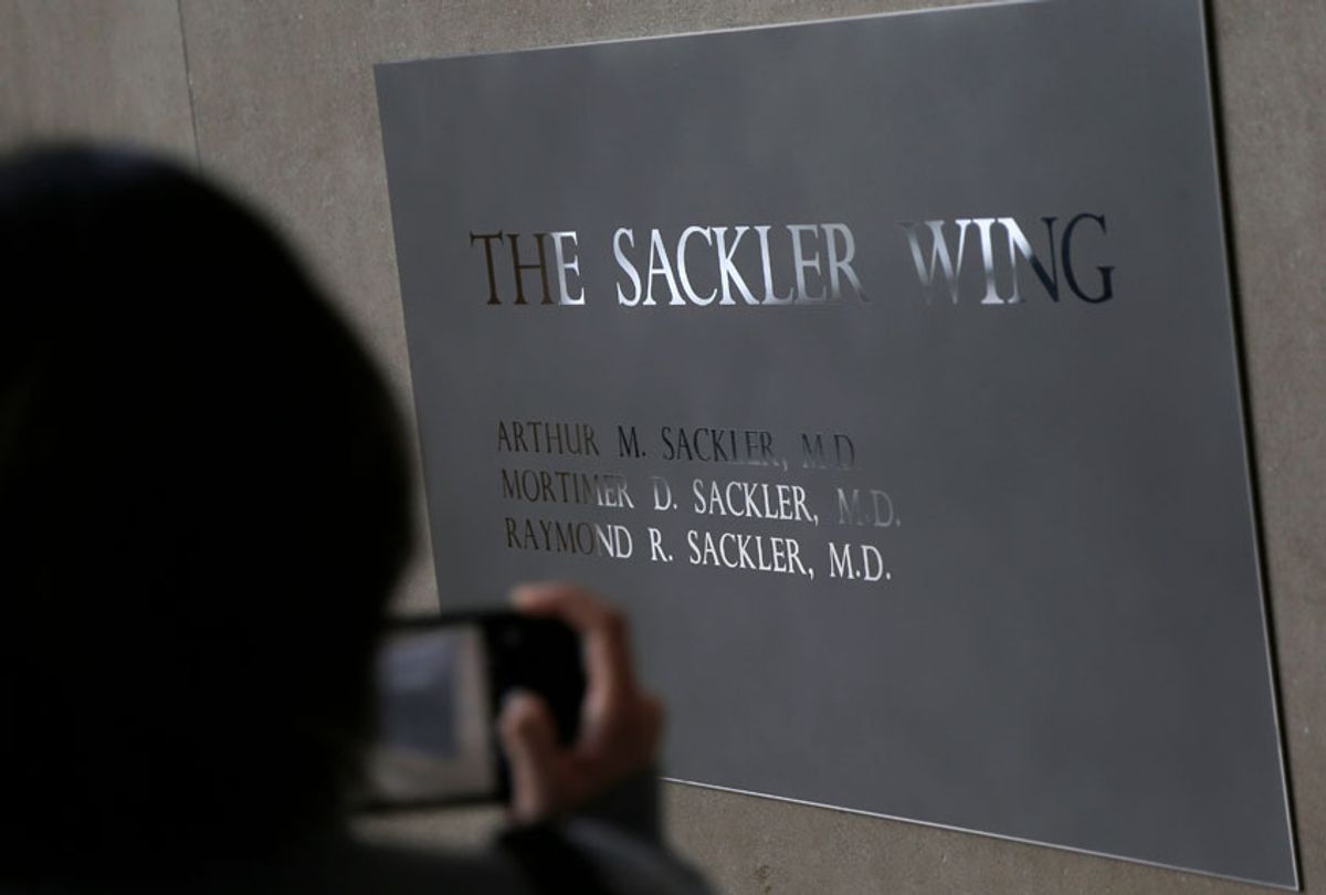 A sign with some names of the Sackler family is displayed at the Metropolitan Museum of Art in New York, Thursday, Jan. 17, 2019. (AP/Seth Wenig)
