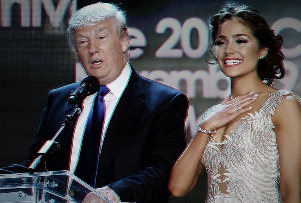Donald Trump speaks onstage as Miss Universe 2012 Olivia Culpo looks on.