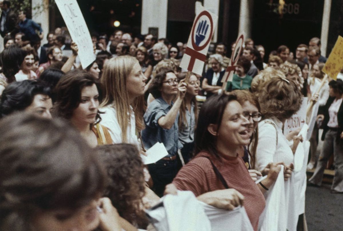 Women's rights marchers parade down Fifth Avenue in New York in part of a nationwide day of demonstrations for the women's liberation movement, 1970. (AP Photo)