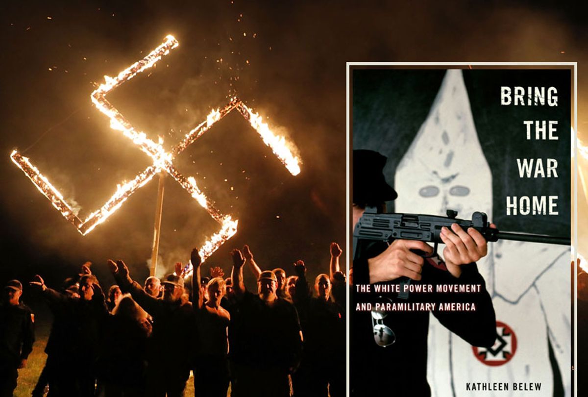 Members of the National Socialist Movement hold a swastika burning after a rally on April 21, 2018 in Draketown, Georgia; "Bring the War Home" by Kathleen Belew (Getty/Spencer Platt/Harvard University Press)
