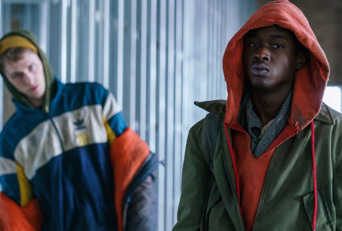 Colson Baker and Ashton Sanders in "Captive State" (Parrish Lewis/Focus Features)