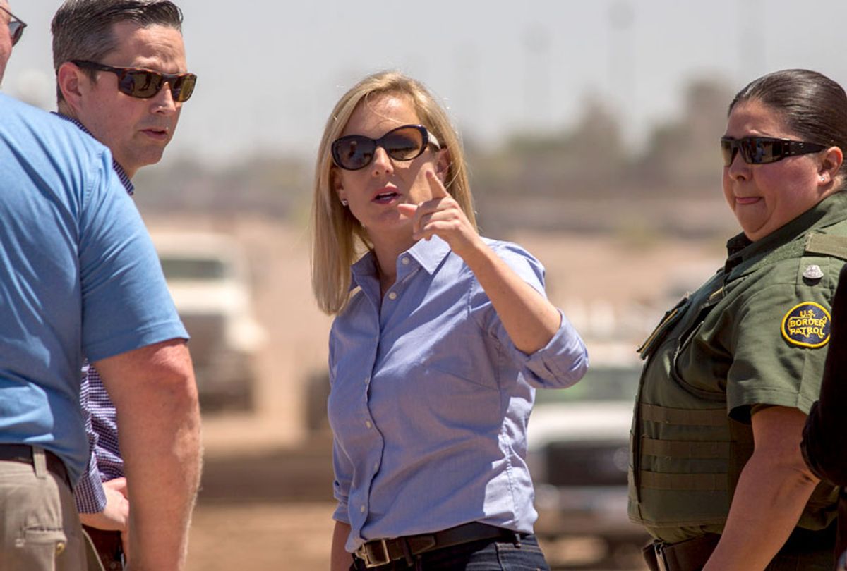 U.S. Department of Homeland Security Secretary Kirstjen Nielsen tours a replacement border wall construction site on April 18, 2018 in Calexico, California. (Getty/David McNew)
