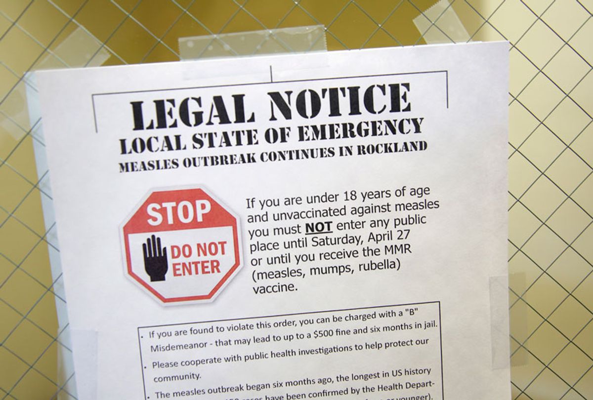A sign explaining the local state of emergency because of a measles outbreak at the Rockland County Health Department in Pomona, N.Y., March 27, 2019. (AP/Seth Wenig)
